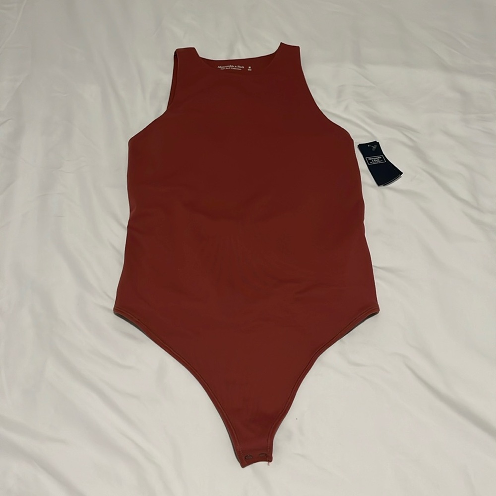 Abercrombie and fitch women’s size M open back bodysuit NWT